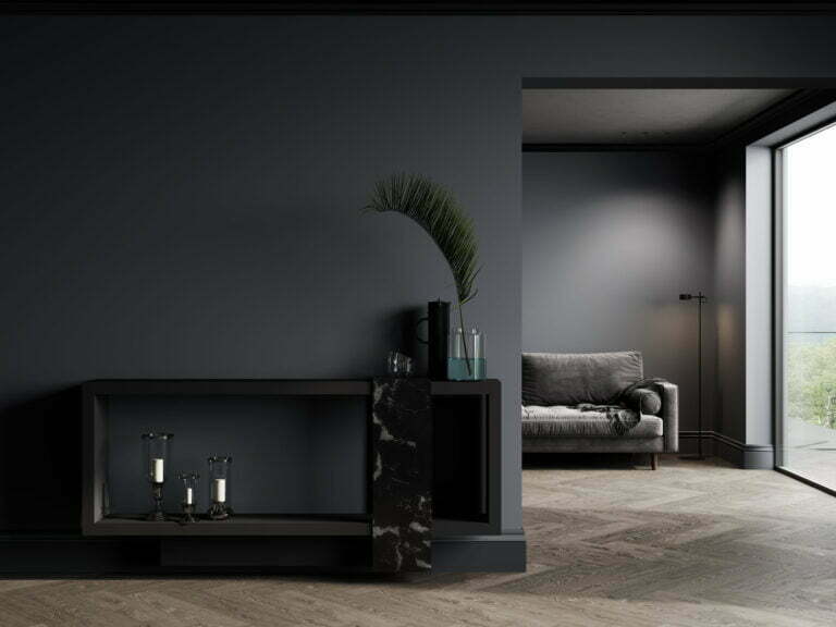 Luxury living room interior featuring dark walls, modern furniture, decorative plant, and large windows showcasing