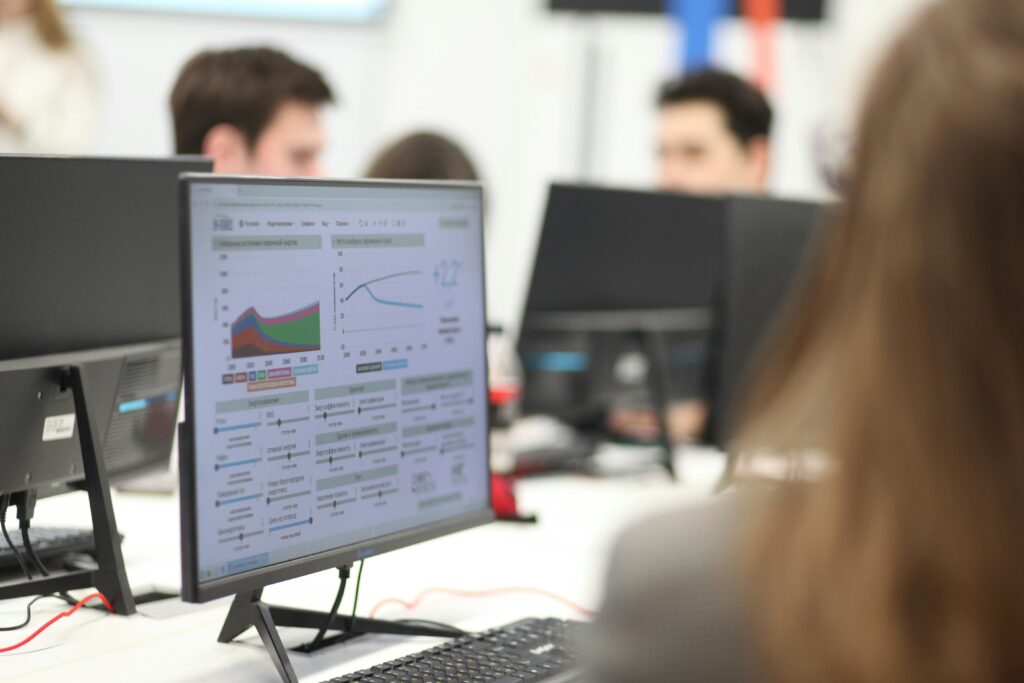 a person looking at a computer screen